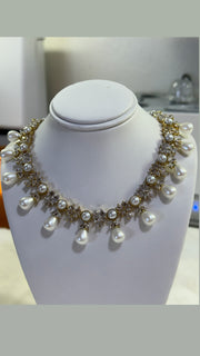 Gilded Petal Pearl Necklace