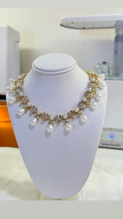 Gilded Petal Pearl Necklace